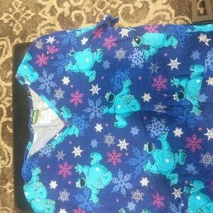 Sesame Street size S scrub top. Has been gently worn.